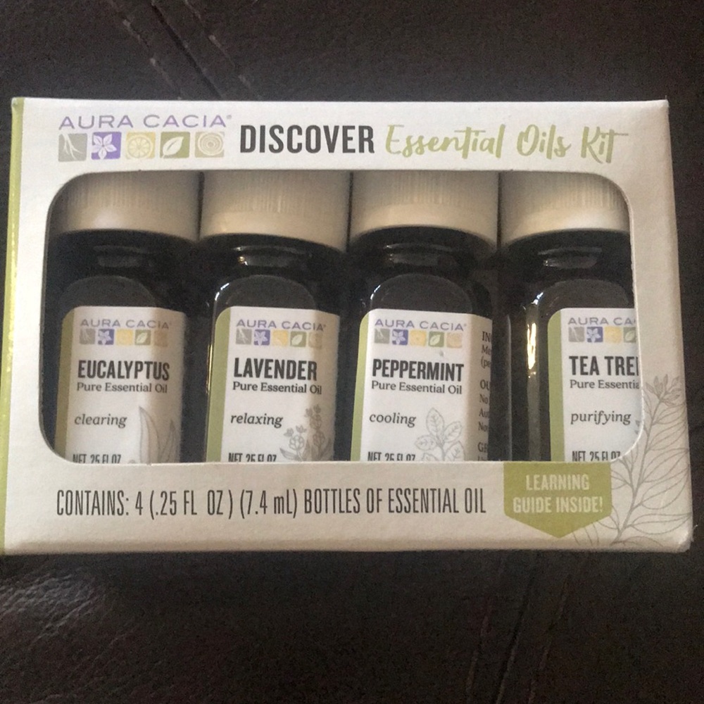 4 pack Aura Cacia Essential Oils and mini diffusers